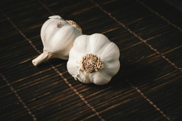 Fresh garlic bulbs ready for backyard planting